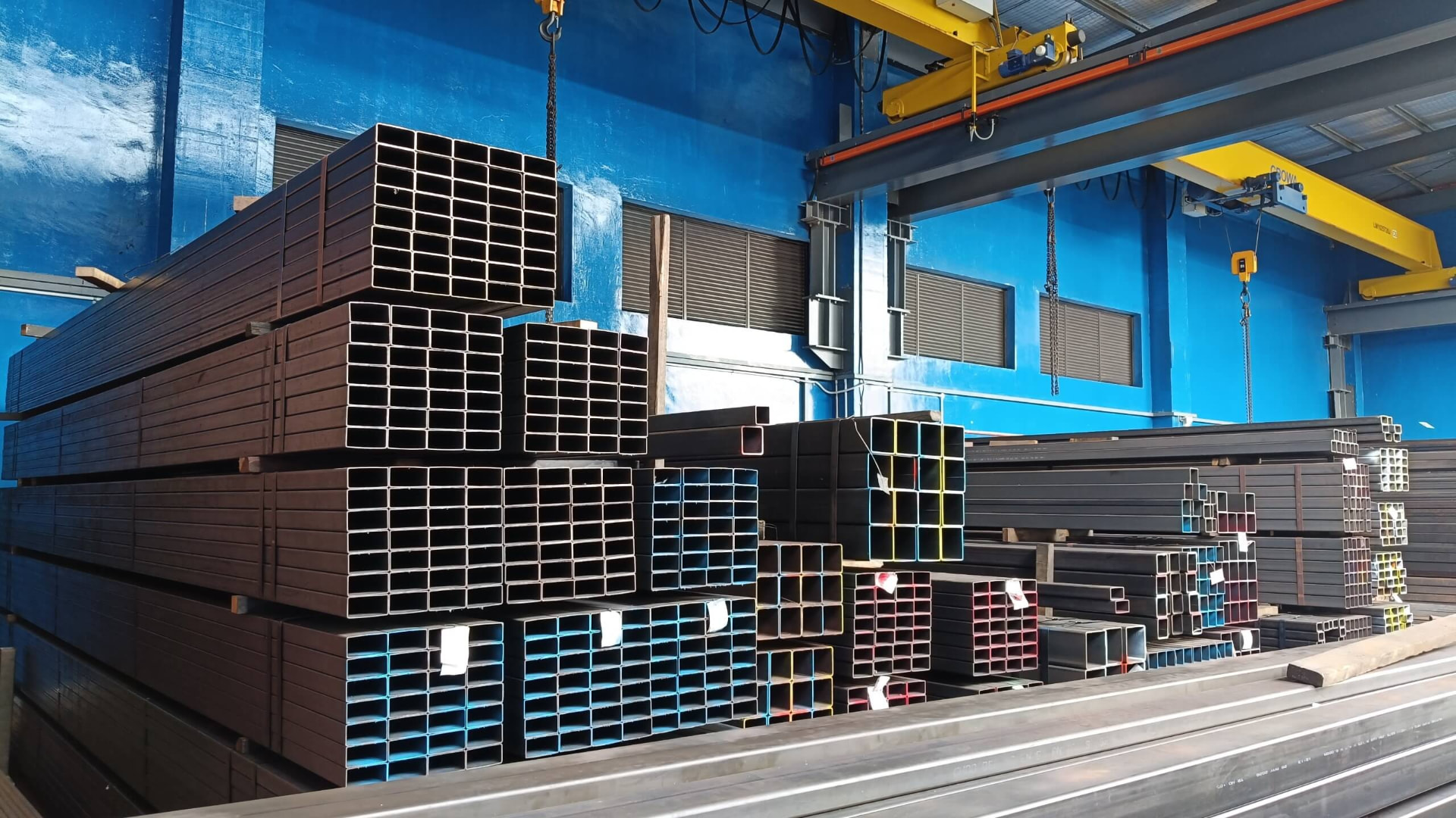 Steel hollow sections and beams stocked in the Kah Teck processing bay