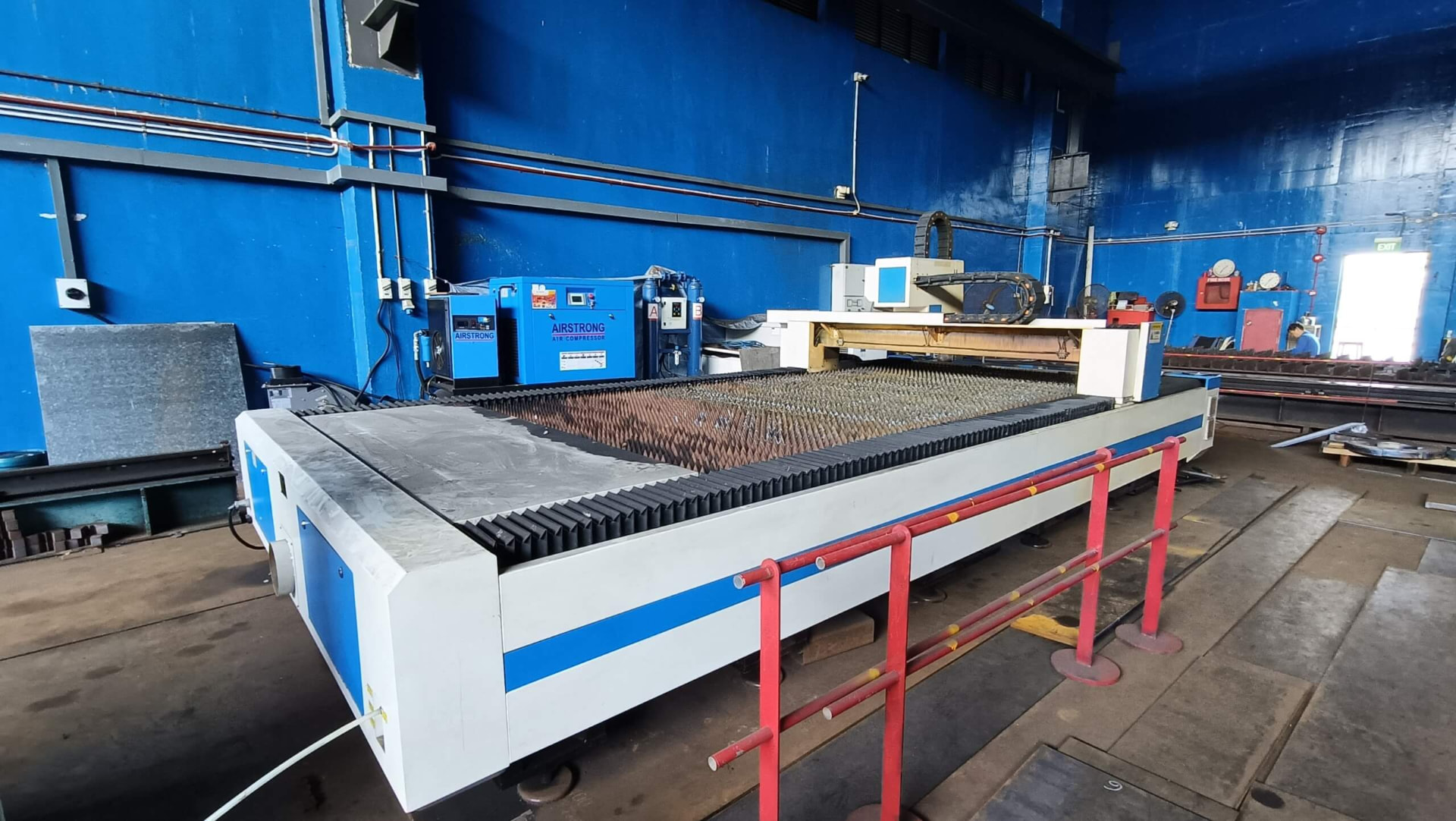 CNC laser cutting bed at the Kah Teck facility